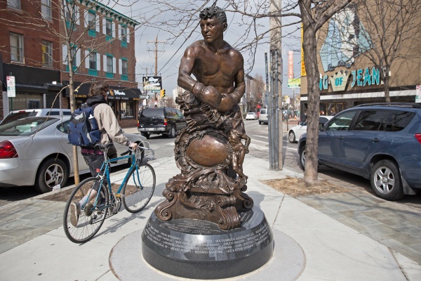 This statue at the junction of East Passyunk Avenue and Mifflin and 13th streets honors South Philly boxer Joseph Giardello. (Lindsay Lazarski/WHYY)