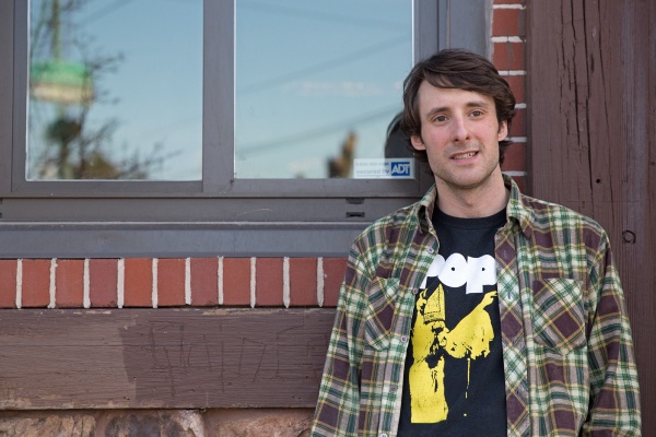 Steve White, a cook at Pub on Passyunk East, moved to Philadelphia from Boston fewer than two years ago. He says the neighborhood bar is usually bustling with customers. (Lindsay Lazarski/WHYY)