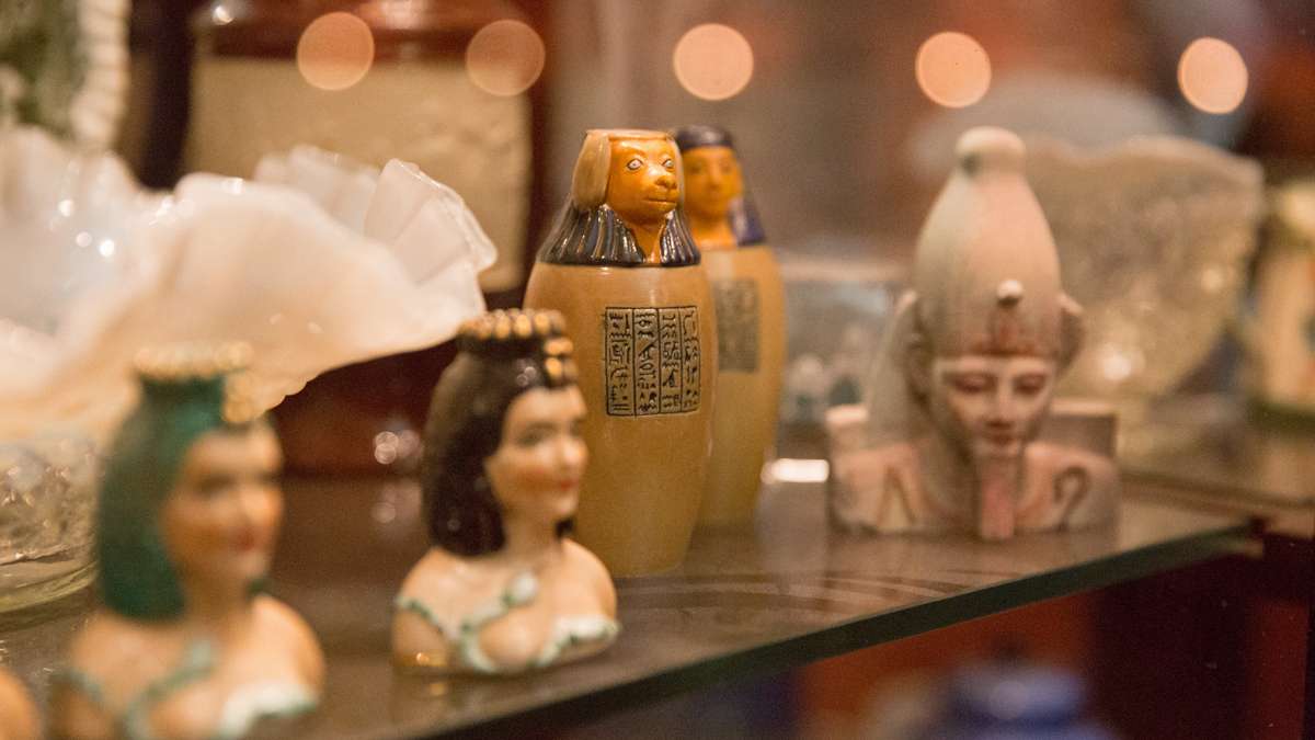 On Friday, the Penn Museum celebrates 100 years of the sphinx, a mythological creature without the body of a lion and human like head.  Many of the Wegners' kitschy sphinxes will also be on display at the museum.  (Lindsay Lazarski/WHYY)