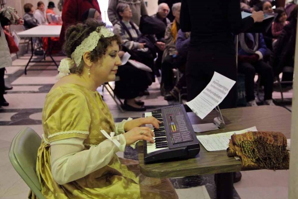 <p><p>Jane Jennings, who portrays Mrs. Bennet in the Old Academy Players' performance of "Pride and Prejudice," doubles as a musician for the dance scene. (Emma Lee/for NewsWorks)</p></p>
