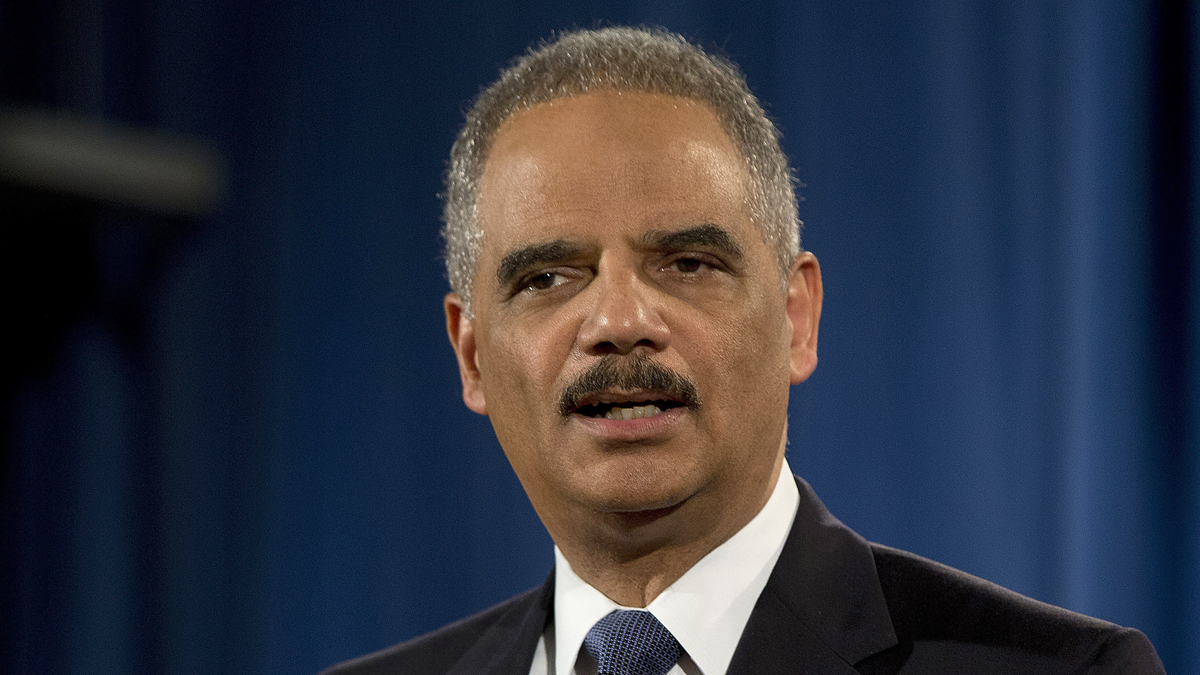 In this March 4, 2015, file photo, then-Attorney General Eric Holder speaks at the Justice Department in Washington. Uber CEO Travis Kalanick will take a leave of absence for an unspecified period and let his leadership team run the troubled ride-hailing company while he’s gone. Kalanick told employees about his decision Tuesday, June 13, 2017, in a memo. The announcement comes as former U.S. Attorney Eric Holder released a list of recommendations to improve Uber's toxic culture. (AP Photo/Carolyn Kaster, File) 