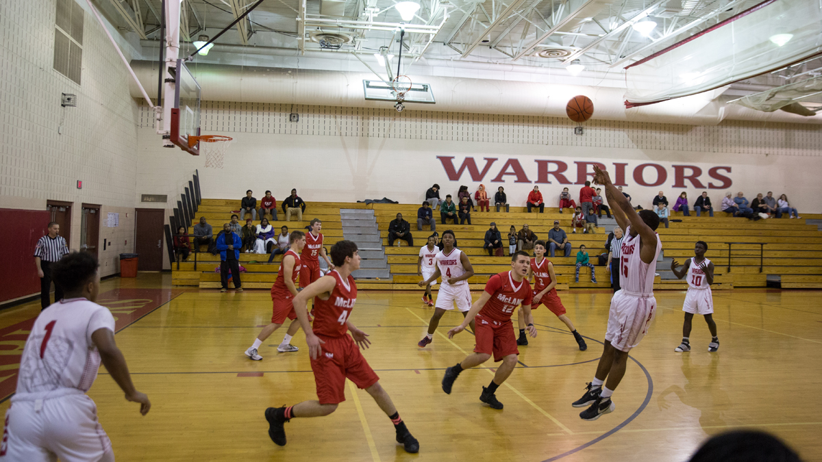  East High School Warriors played the General McLane Lancers, a suburban team.  By halftime, the Warriors were down only two points. But in the second half, the team struggled to keep up. The General McLane Lancers pulled ahead, and won 72 to 58. (Lindsay Lazarski/WHYY) 