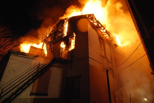 <p><p>Police are trying to identify the man whose body they found beneath the rubble of this burned out home on W. 5th Street in Wilmington. (John Jankowski/for NewsWorks)</p></p>
