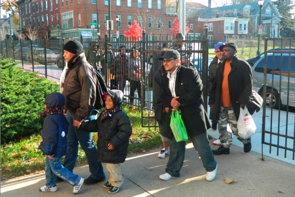 <p><p>Shantale Jefferson and her children were first in line for their meals. (Kiera Smalls/for NewsWorks)</p></p>
