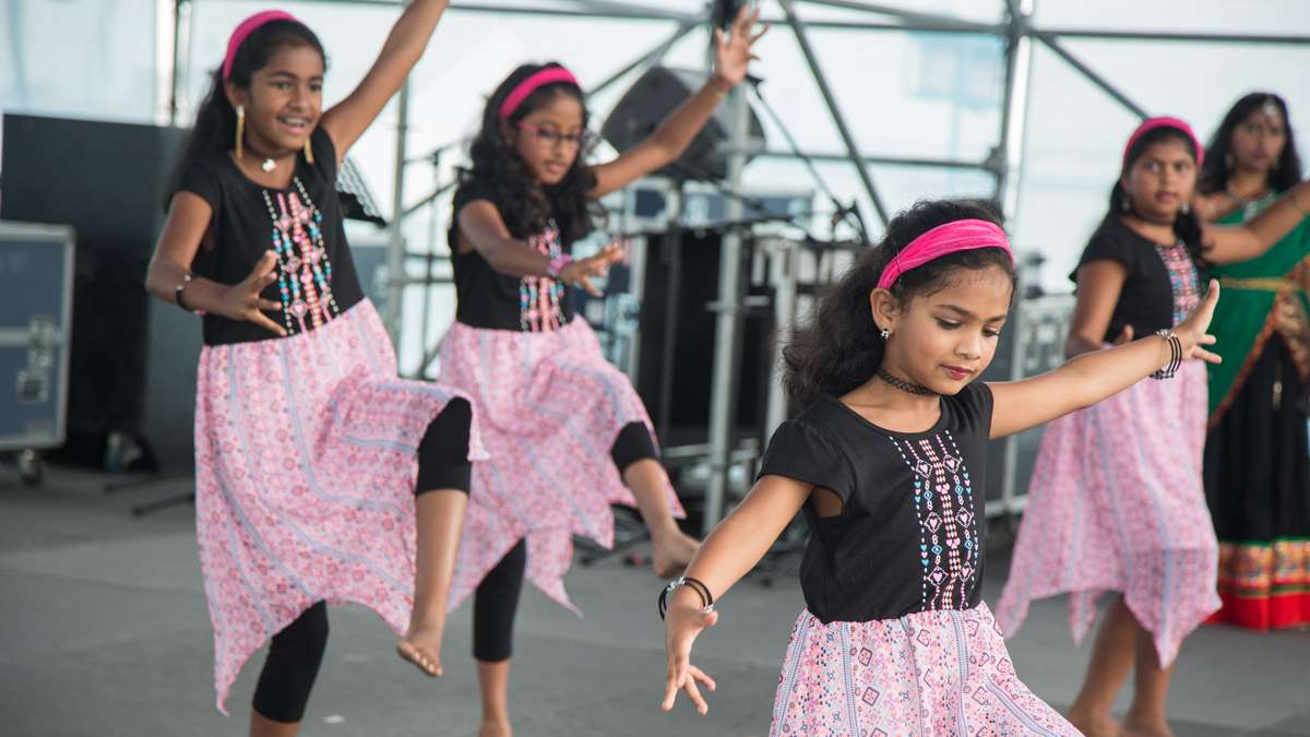 Dancers perform on stage during the Festival of India at Penn's Landing Saturday, Aug. 12, 2017. (Emily Cohen for NewsWorks)