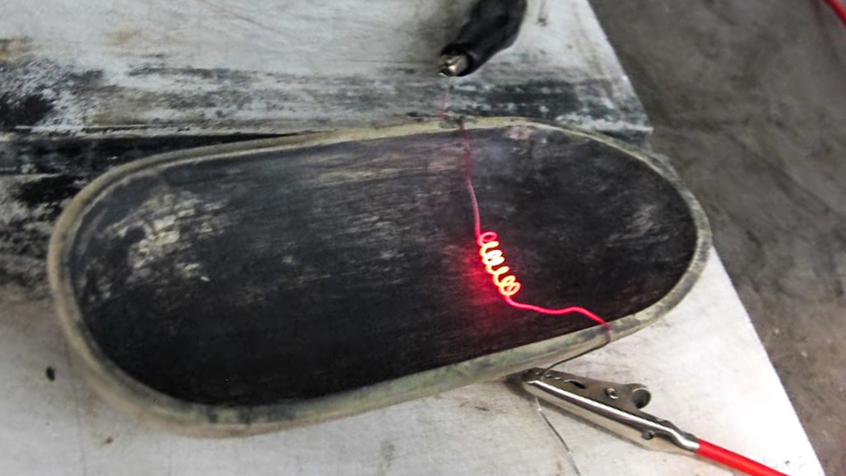A hot coil in Matt Cline's lab. (Liz Reid/for WHYY)
