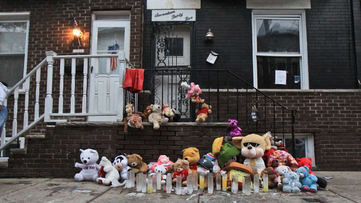 A memorial for Nasir Slaughter, a 17 year-old who was gunned down in August, 2013, is shown. He was killed over a neighborhood dispute