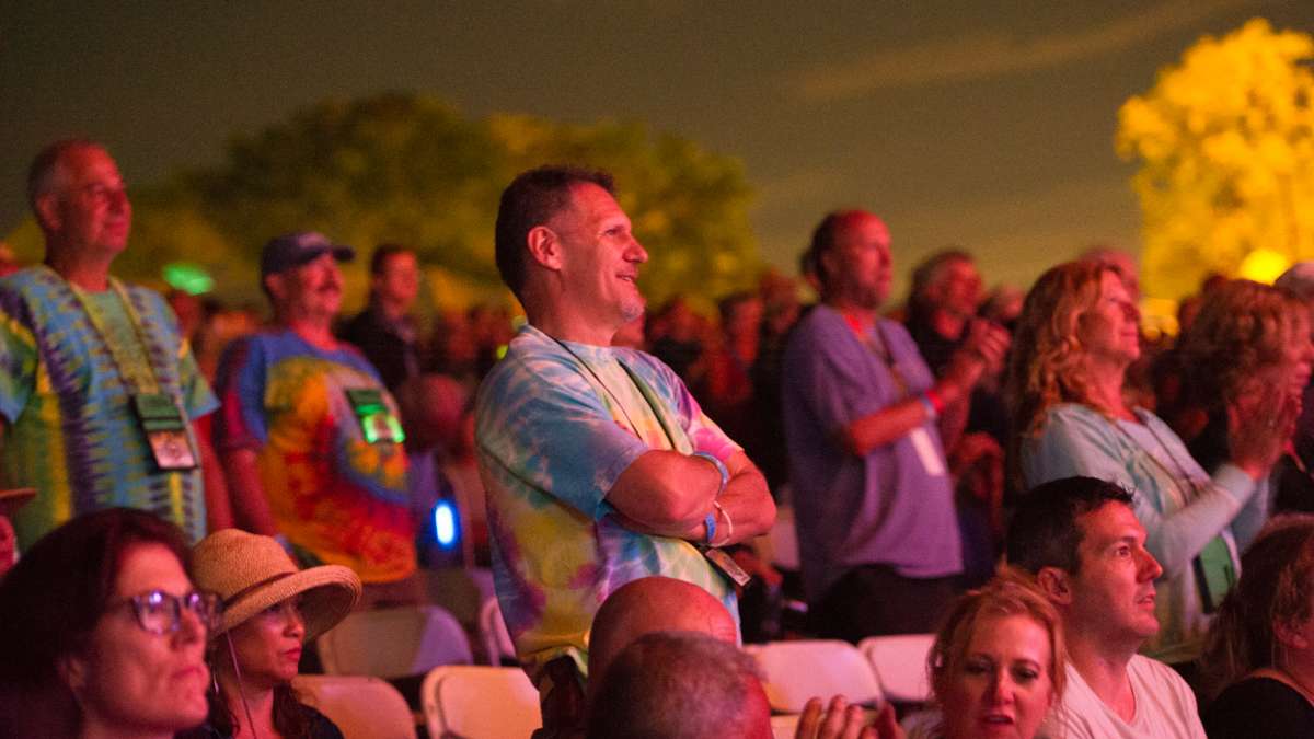 Members of the audience stand and applaud Graham Nash during his performance. (Jonathan Wilson for NewsWorks)