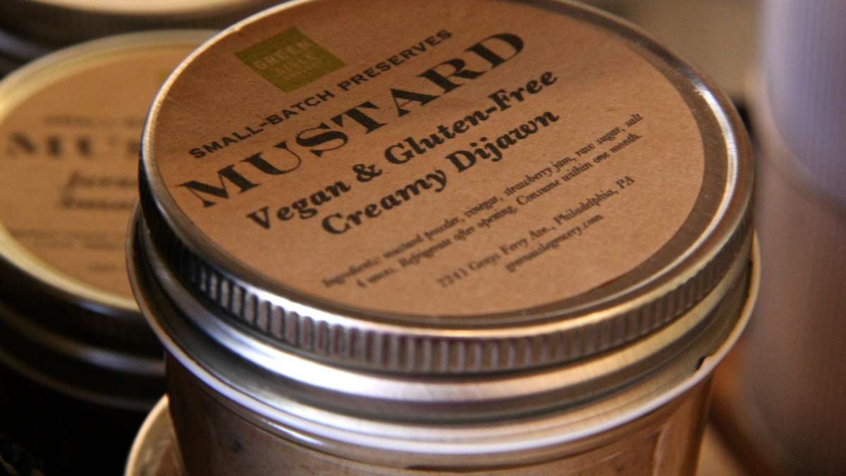 The Green Aisle Grocery labels its mustard 'Creamy Dijawn' in reference to its Philly origin. (Emma Lee/WHYY)