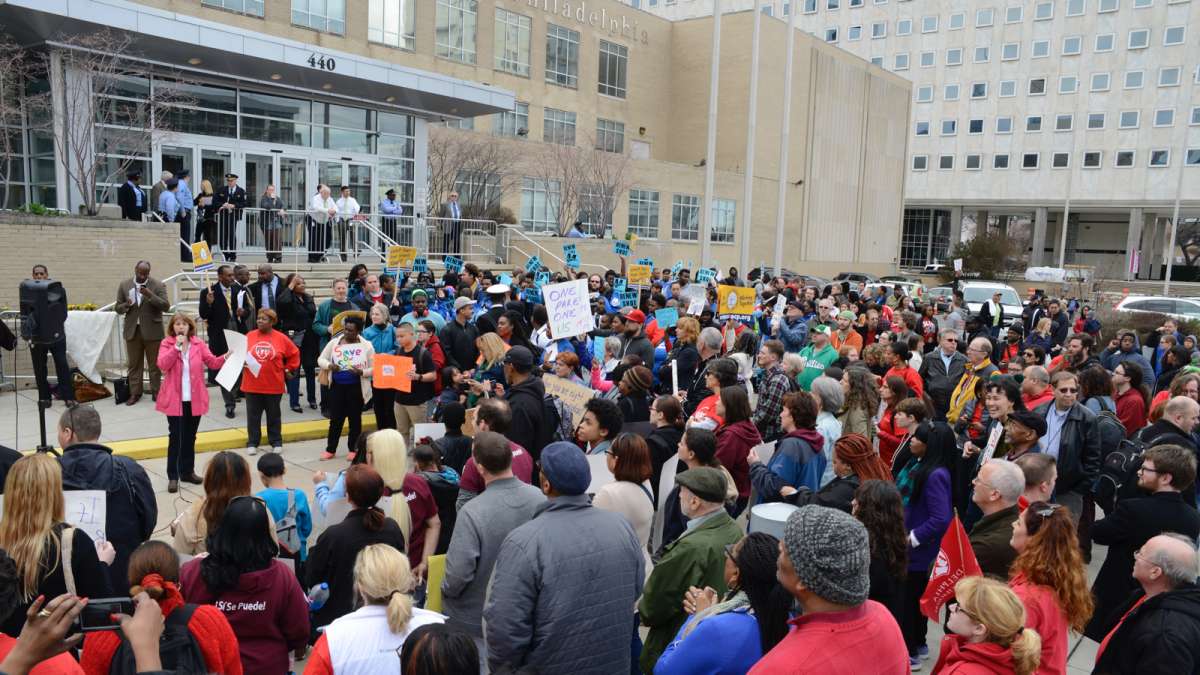 Retired teacher Lisa Haver speaks against the Wister conversion at a rally held outside district headquarters in March 2016. (Bastiaan Slabbers for WHYY)