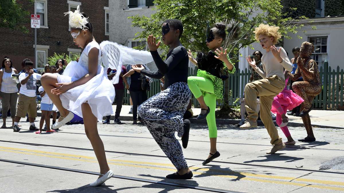 Students with the Kama-Sahlor Group, directed by Lisa Hopkins, bring a dance performance.