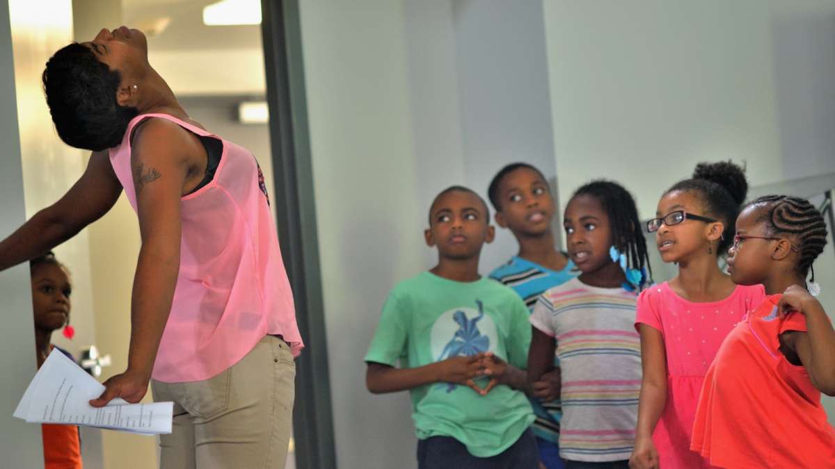 Students watch acting teacher Doree Watkins. (Bas Slabbers/for NewsWorks)
