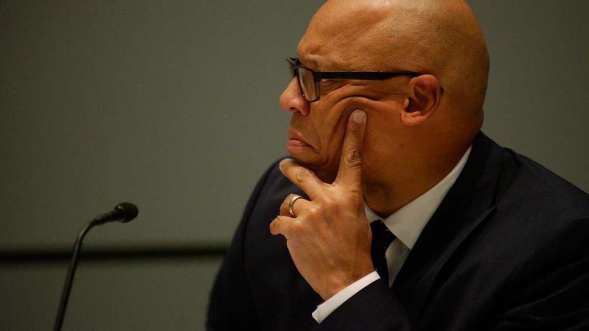 SDP Superitendent Dr. Hite is seen listening to a speaker.