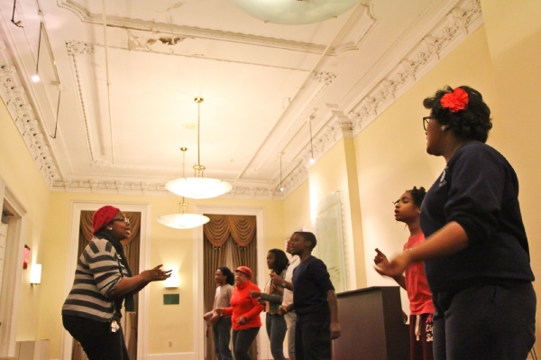<p><p>Cast members of the theatre's holiday musical, "Celebrate!" rehearse in a side room, where water damage has left the ceiling falling apart, one of many repairs needed in the buildings. (Kimberly Paynter/for NewsWorks)</p></p>
