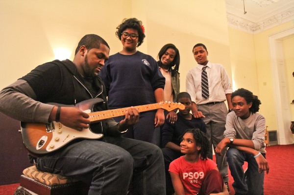 <p><p>Students, ages 11-16, in the Freedom Theatre's performing arts training program, rehearse with guitarist Harry Wilson for a holiday musical, "Celebrate!" (Kimberly Paynter/for NewsWorks)</p></p>
