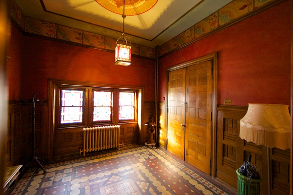 <p><p>The main entrance to the Knowlton Mansion in Fox Chase, Pa., still has its original stained-glass windows, also designed by Frank Furness. (Nathaniel Hamilton/for NewsWorks)</p></p>
