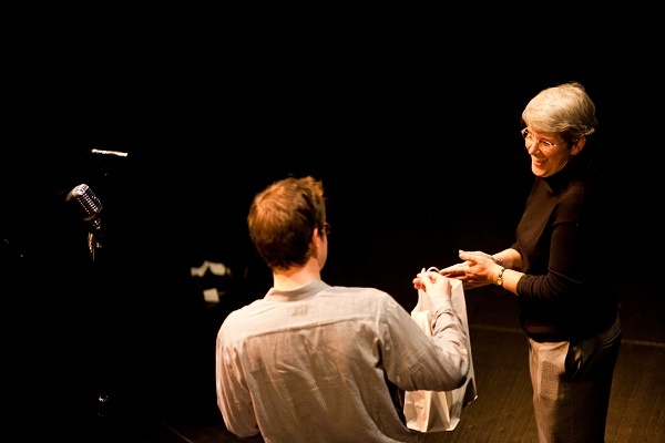<p><p>Allen Drew gives a coordinator Mary Ann Case a token of appreciation. (Brad Larrison/for NewsWorks)</p></p>
