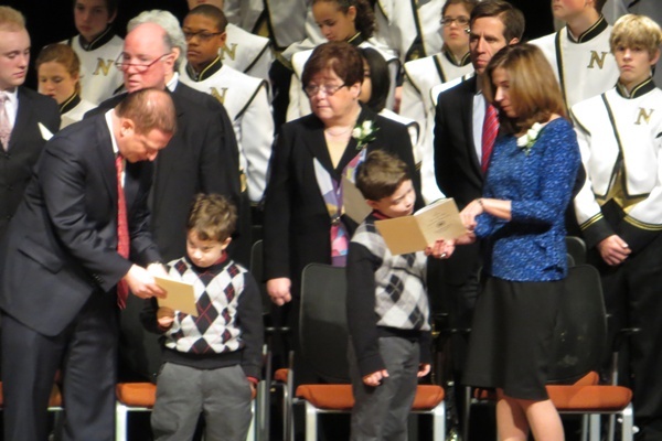 <p><p>Lt. Governor Matt Denn and his wife Michele try to help their twin sons with the lyrics of "Our Delaware", the official state song. (Kim Phan/for NewsWorks)</p></p>
