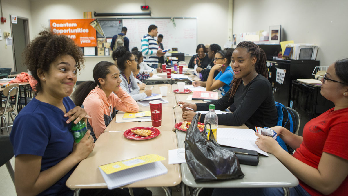  Liz Herrera-Reynoso, 14, left, and Eskarlena Conce-Molina, 14, right, both students of York Technical High School, attend an after school college prep program with kids from throughout the county in York, Pennsylvania. (Jessica Kourkounis/For Keystone Crossroads) 