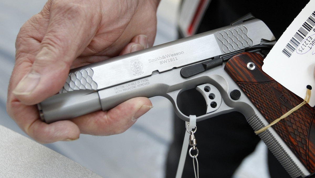  A .45 cal pistol at the display set up before the National Rifle Association's annual meeting in Pittsburgh, in 2011. (AP Photo) 