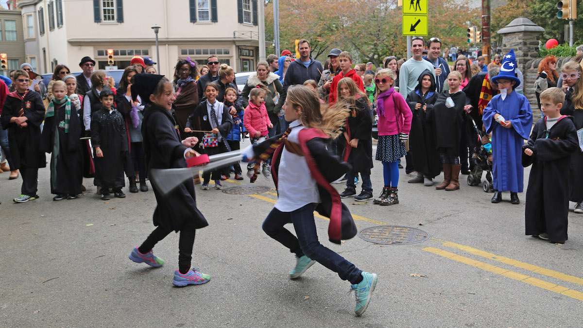 (L-R) Flora and Jordana, friends from Baldwin School sward fighting at the Defense Against the Dark Arts Classes (Natavan Werbock/for NewsWorks)