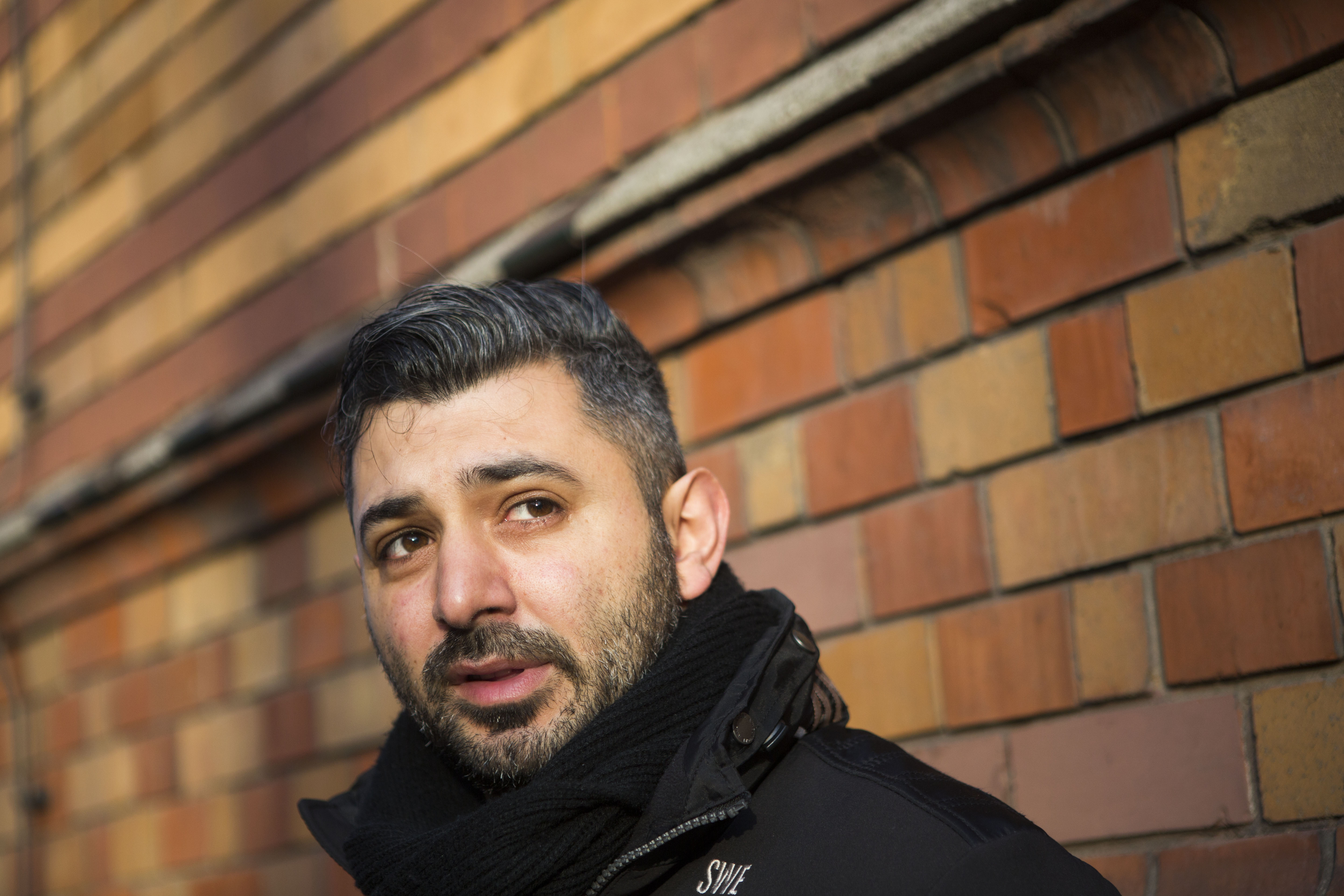 </b> Hassan Hijazi sends his seven-year old daughter to Gustav-Falke elementary school in Wedding. (Jessica Kourkounis/For Keystone Crossroads)