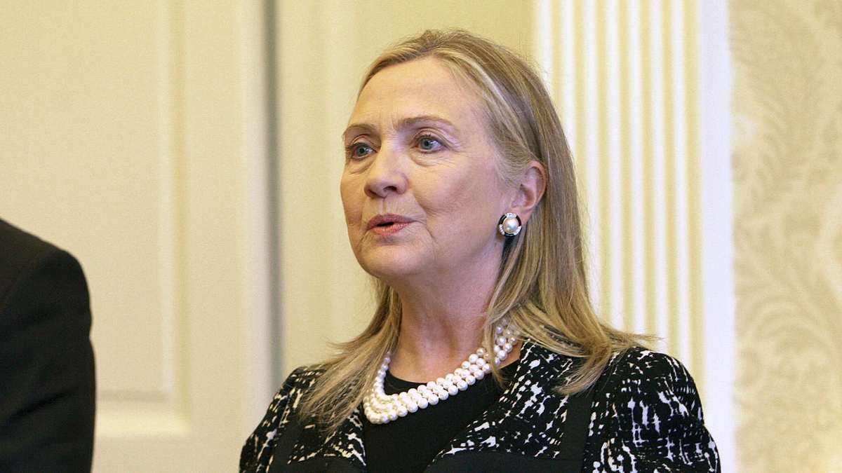  US Secretary of State Hillary Rodham Clinton with Northern Ireland's deputy First Minister Martin McGuinness, during their press conference at Stormont Castle in Belfast as part of her four-day trip to Europe, Friday Dec. 7, 2012. (AP Photo/Paul Faith, Pool) 