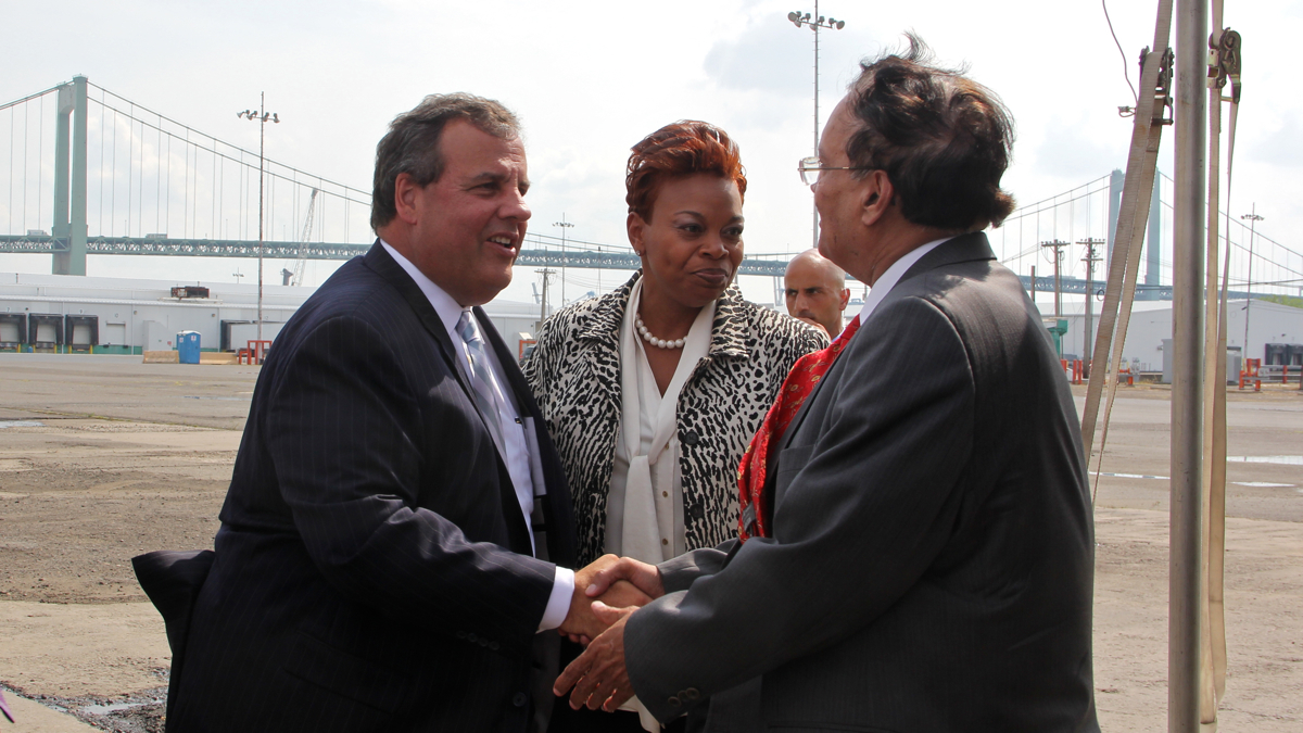  Gov. Chris Christie and Camden Mayor Dana Redd greet Krishna Singh, president of Holtech International, in July 2014. Singh said he would bring jobs to Camden in exchange for up to $260 million in tax incentives. (Emma Lee/WHYY) 