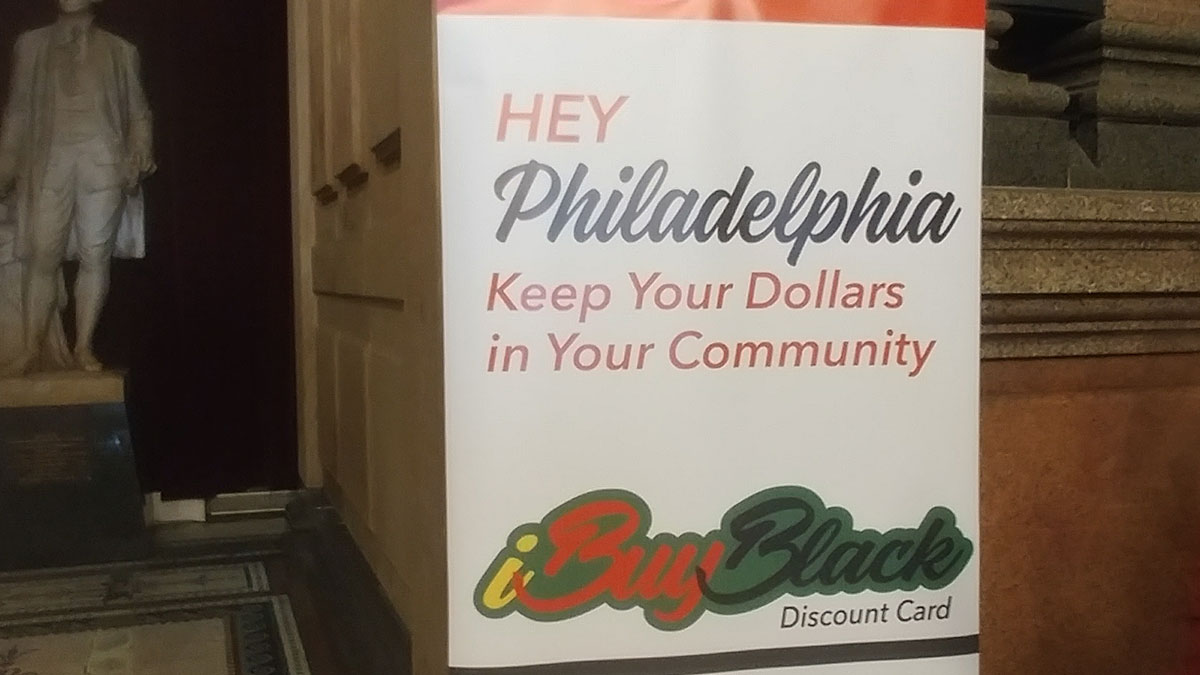  Promotional poster for the new 'iBuyBlack' card. (Tom MacDonald/WHYY) 