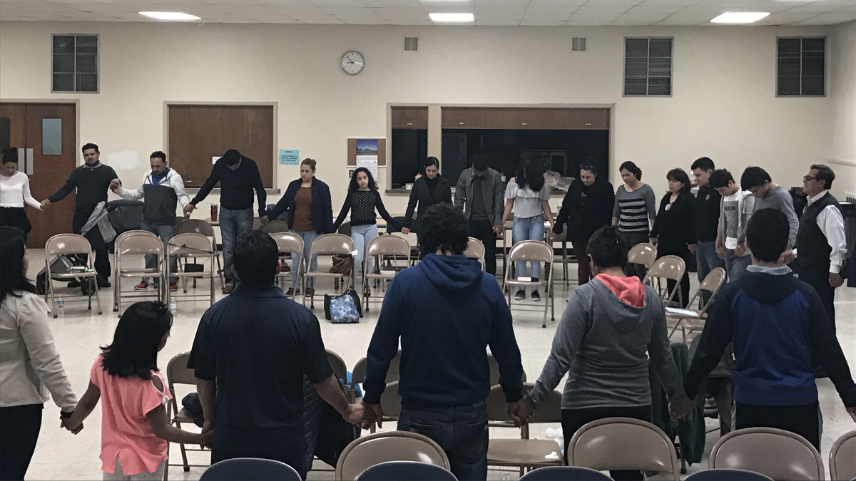  Community members gather for a  vigil for Jonatan Palacios Euceda  at the Central Presbyterian Church in Norristown May 13, two days after he was arrested by immigration officers. (Lillie Williams) 