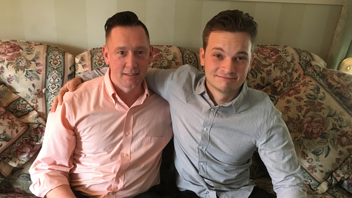  Tristan Iveson (right) traveled from Australia to South Jersey to meet Rhett Hackett and his family. Hackett helped Iveson begin to heal from the sexual abuse he suffered as a child. Hackett also was molested when he was young. (Anne Hoffman/for NewsWorks) 
