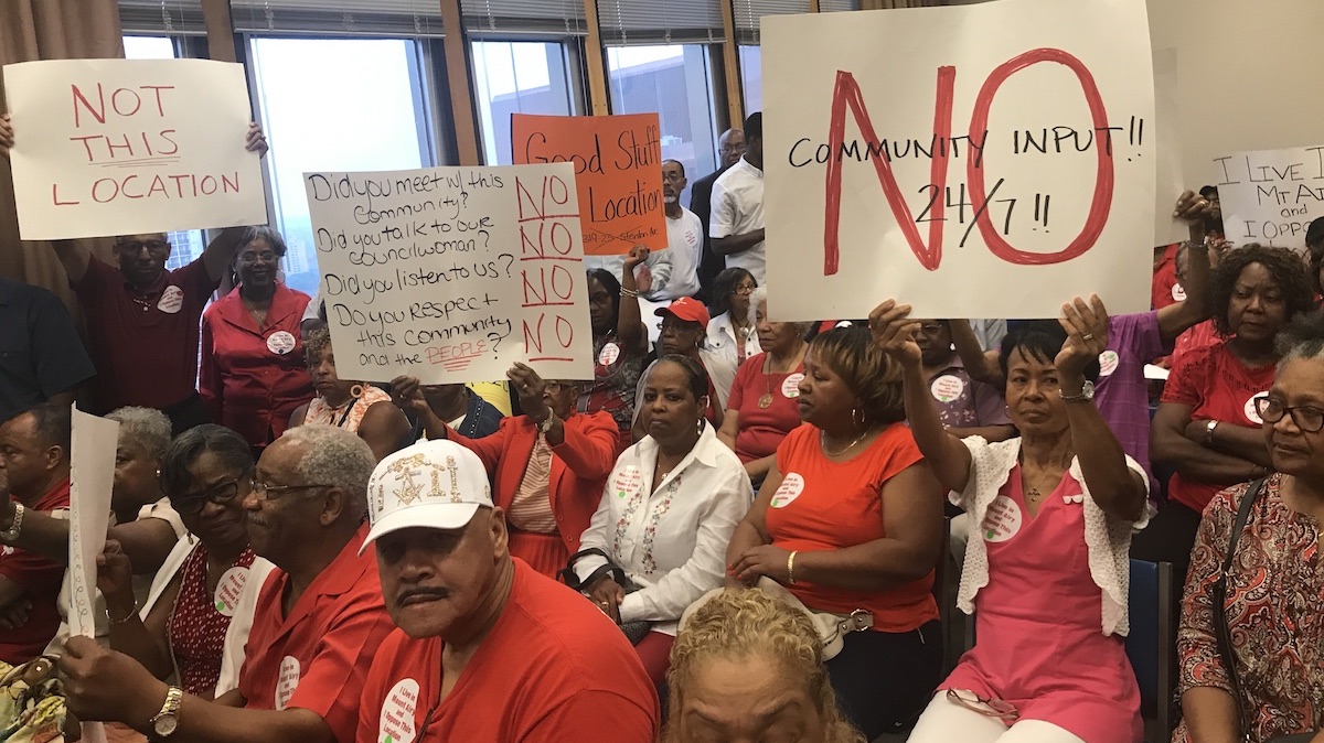  Residents pack a Zoning Board of Adjustment hearing Tuesday to protest a medical marijuana dispensary, which in March gained city approved to open in Mt. Airy. (Bobby Allyn / WHYY) 