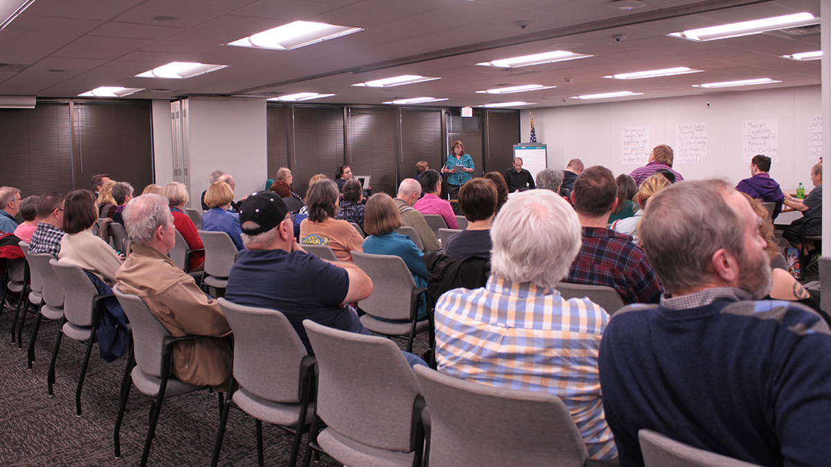 At a people's town hall in Washington, Pa., near Pittsburgh, Leeann Howell tells the crowd how much her family depends on the Affordable Care Act. Howell urged her Congressman, Tim Murphy (R-18) to reject repeal. Murphy was invited to the event, but did not attend. It was one of several town halls held throughout Pennsylvania with or without elected representatives. (Margaret J. Krauss / 90.5 WESA)  