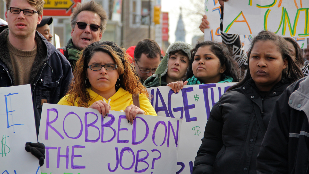  Protesters in front of the McDonald's at Broad Street and Girard Avenue rally against 