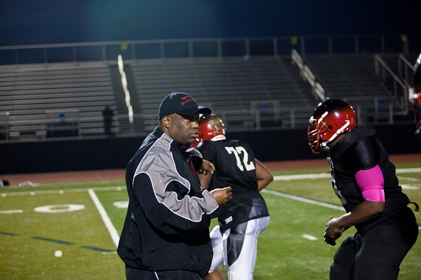 <p><p>Assistant Coach Troy Gore works with offensive linemen at Tuesday's practice. (Brad Larrison/For NewsWorks)</p></p>
