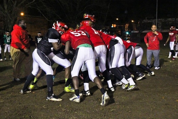 <p><p>At the end of Monday's conditioning practice at the Lonnie Young Rec Center fields in East Germantown, the players engage in rugby scrum-like drills which got a bit heated. (Kimberly Paynter/for NewsWorks)</p></p>
