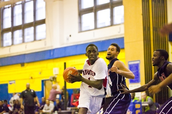 Brandon Austin of Imhotep tries to get to the basket in action against Philadelphia Electrical on Saturday. (Brad Larrison/for NewsWorks)
