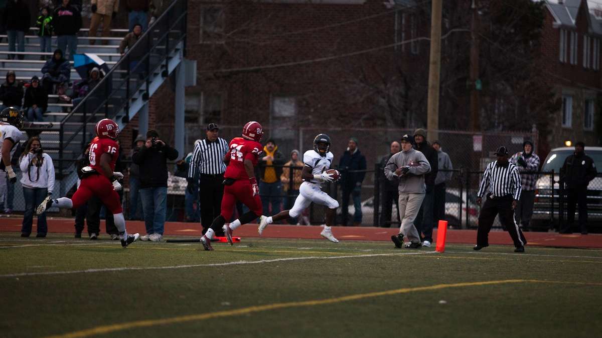 Wood's Jarrett McClenton runs toward the endzone for his second touchdown of the game. (Brad Larrison/for NewsWorks)