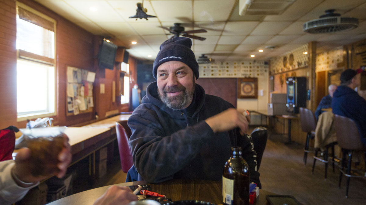  Jim Ragan, who works third shift at the cold storage plant, at the American Legion Bar in Hazleton, Pennsylvania. (Jessica Kourkounis/For Keystone Crossroads) 