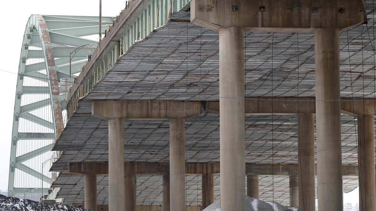  In this file photo, a covering is in place under the superstructure as work continues on the Birmingham Bridge that spans the Monongahela River in Pittsburgh.  (AP file Photo/Keith Srakocic) 