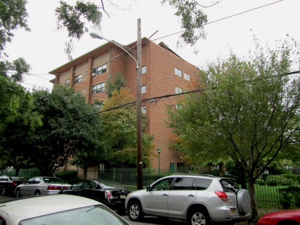 Loose roof on an apartment building at 17th and Fitzwater Streets. (Kimberly Paynter/For NewsWorks)