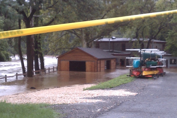 Flood water covered parts of the Philadelphia Canoe Club off Ridge Avenue in East Falls Sunday. (Megan Pinto/For NewsWorks)