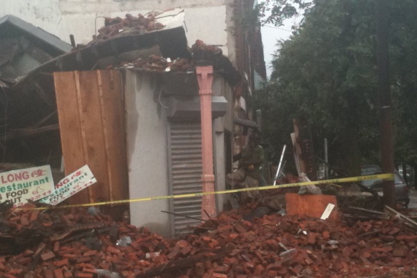 A building in North Philadelphia that housed a restaurant and apartments collapsed Sunday.  Everyone inside was accounted for and was reported to be okay. (Elizabeth Fielder/For NewsWorks)