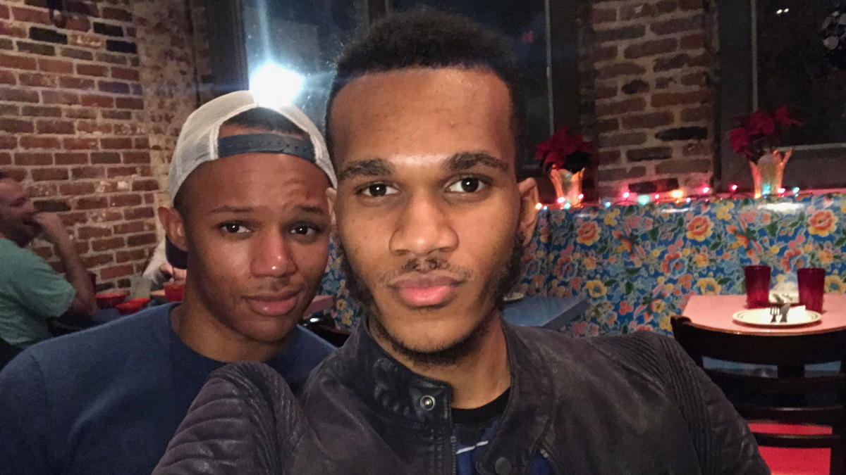  The author is shown with his younger brother Marcus (foreground) on his 21st birthday. (Image courtesy of James Jones) 
