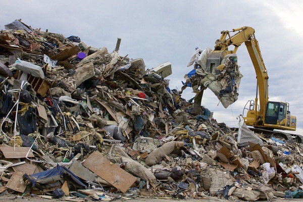 <p>On the edge of town, the remnants of people's lives forms a mountain of debris. ( Jana Shea /for NewsWorks )</p>
