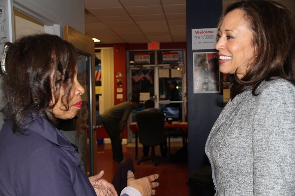 <p><p>Harris speaks with local volunteer Eileen Bowman. (Trenae V.McDuffie/for NewsWorks)</p>
<p> </p></p>
