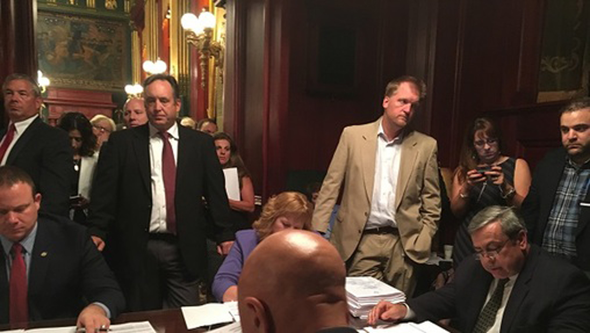  Lawmakers and staff gathered for a Senate Appropriations meeting to pass a bipartisan spending plan. (Photo by Katie Meyer/WITF) 