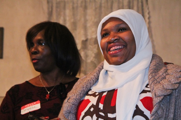 <p><p>Johnson House Executive Director Cornelia Swinson recognizes Germantown High School senior Aliyah Muhammad who designed an historic tour of the Johnson House as part of her senior internship. (Kimberly Paynter/WHYY)</p></p>

