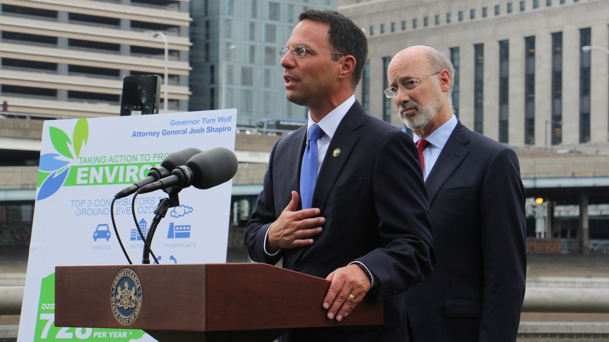   Pennsylvania Attorney General Josh Shapiro and Gov. Tom Wolf announce that the state has joined a lawsuit against the Environmental Protection Agency, which has delayed implementing rules to reduce smog. (Emma Lee/WHYY)  