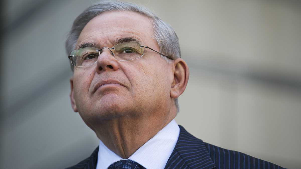   U.S. Sen. Bob Menendez waits to speak outside federal court, Thursday, April 2, 2015, in Newark, N.J. Menendez, the top Democrat on the U.S. Senate Foreign Relations Committee, was indicted on corruption charges, accused of using his office to improperly benefit an eye doctor and political donor. (John Minchillo/AP Photo)  